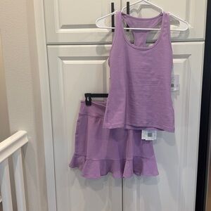 New with tags! Beyond Yoga set: step up racerback tank and dare to flare skirt